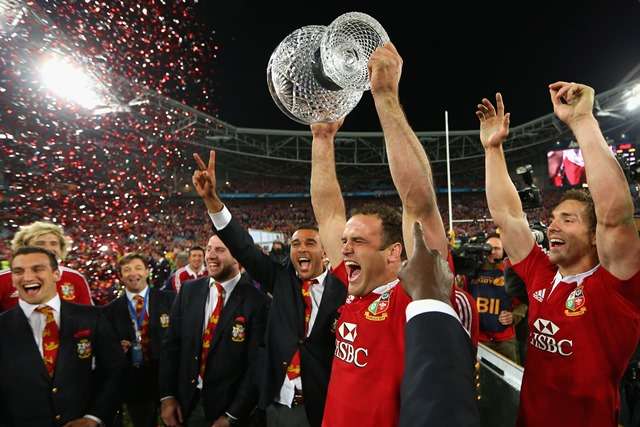 Triumph: Jamie Roberts holds the Tom Richards trophy aloft after success in Australia in 2013 (Picture: Getty Images)