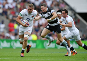 Alex Dombrandt in action for England against the Barbarians