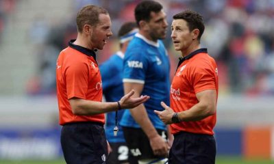 Referee Angus Gardner speaks with his assistant referee Paul Williams
