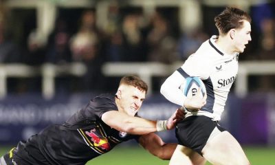 Saracens full-back Angus Hall breaks the tackle of Stefan Coetzee