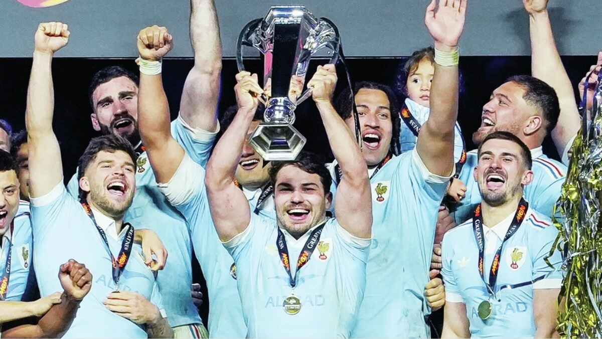 Antoine Dupont lifts the Six Nations trophy for France