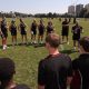 School of Hard Knocks participants join Barbarians stars during a skills session at