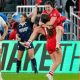Canada’s Alysha Corrigan leaps into the arms of Taylor Perry as they celebrate their win over England