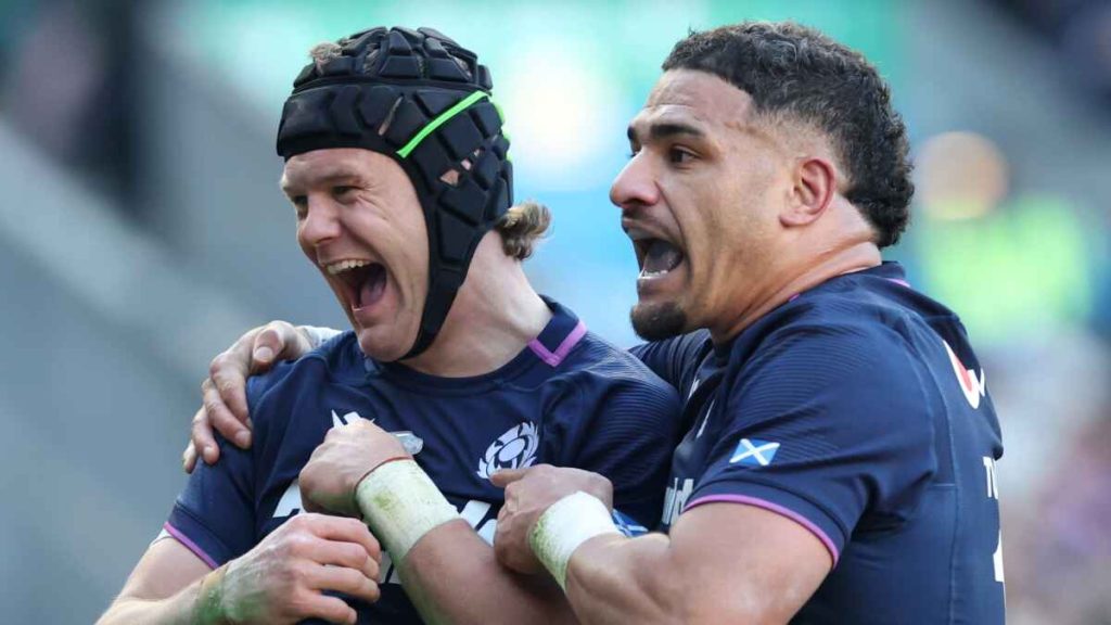 Darcy Graham celebrates with Scotland captain Sione Tuipulotu, inset below, after going over to score