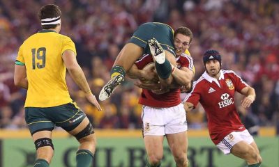 George North carrying Israel Folau on the British & Irish Lions tour in 2013