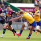Brett Herron on the attack for Harlequins in a game against Bath.