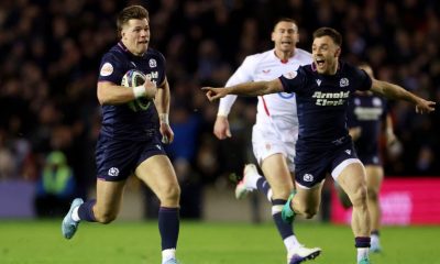 Huw Jones runs in his second try for Scotland