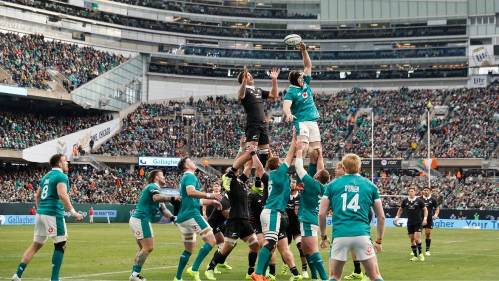 Ryan Baird of Ireland knocks the ball away from Josh Lord of the All Blacks