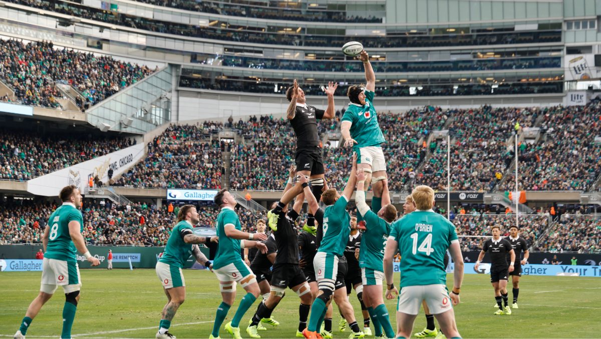 Ryan Baird of Ireland knocks the ball away from Josh Lord of the All Blacks