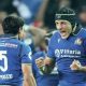 Italy’s Juan Ignacio Brex celebrates with team-mate Ange Capuozzo at full-time