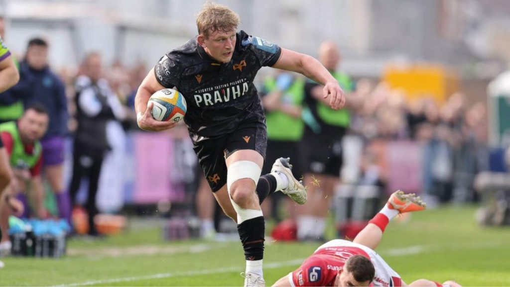 Ospreys' Jac Morgan evades a tackle from Dane Blacker