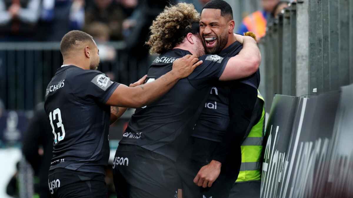 Joe Cokanasiga celebrates scoring a try for Bath with Alfie Barbeary