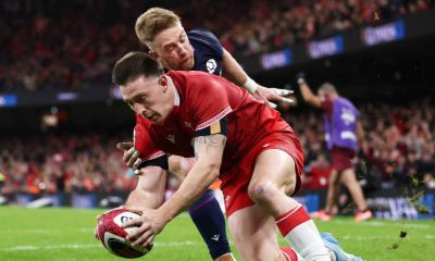 Josh Adams scores the second try for Wales
