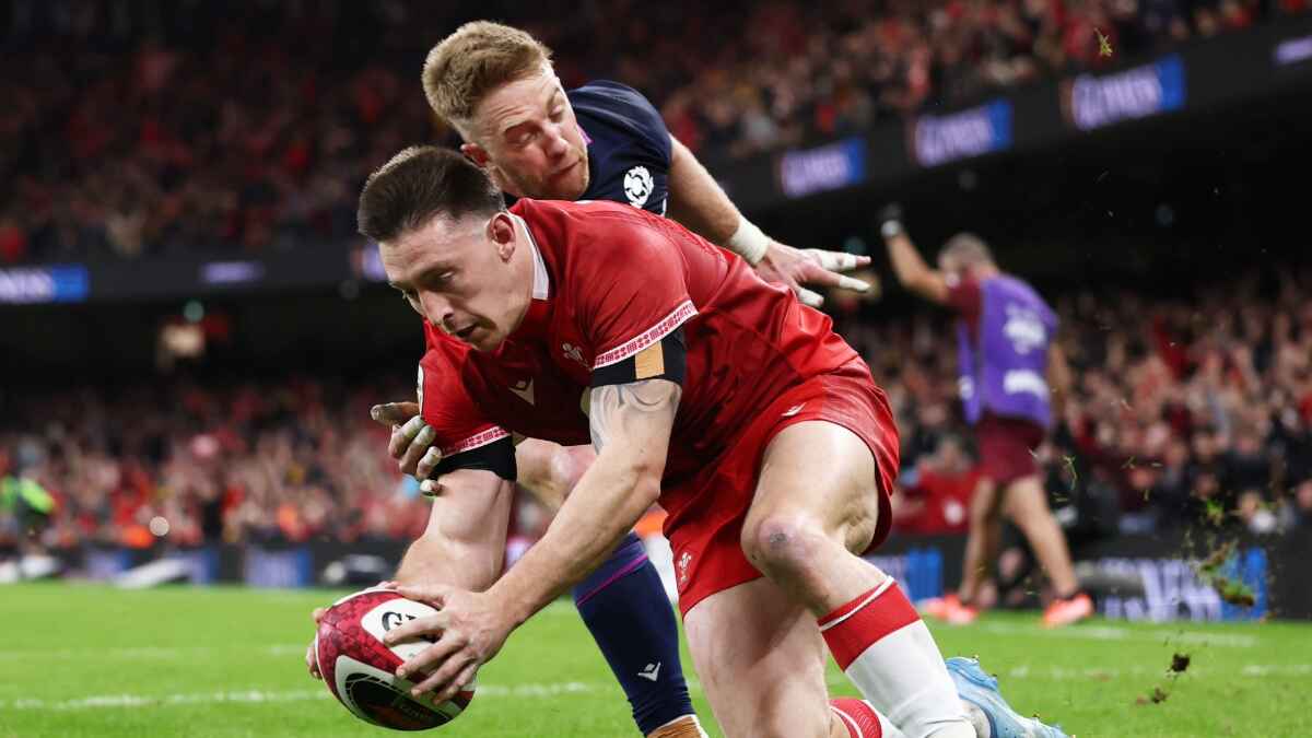 Josh Adams scores the second try for Wales