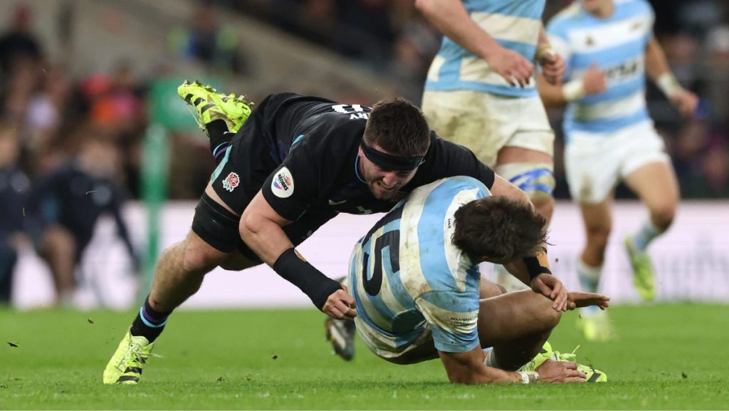 Juan Cruz Mallia of Argentina is tackled by Tom Curry, which resulted in him being replaced due to injury