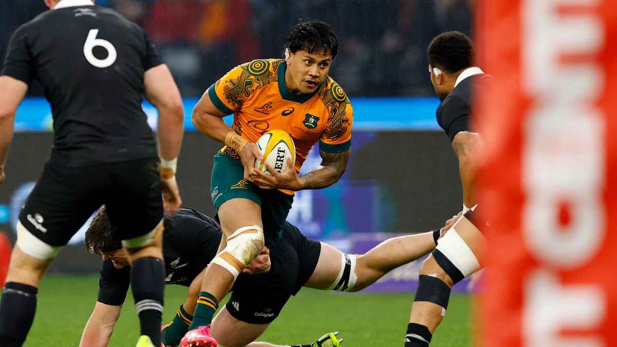 Len Ikitau playing for Australia