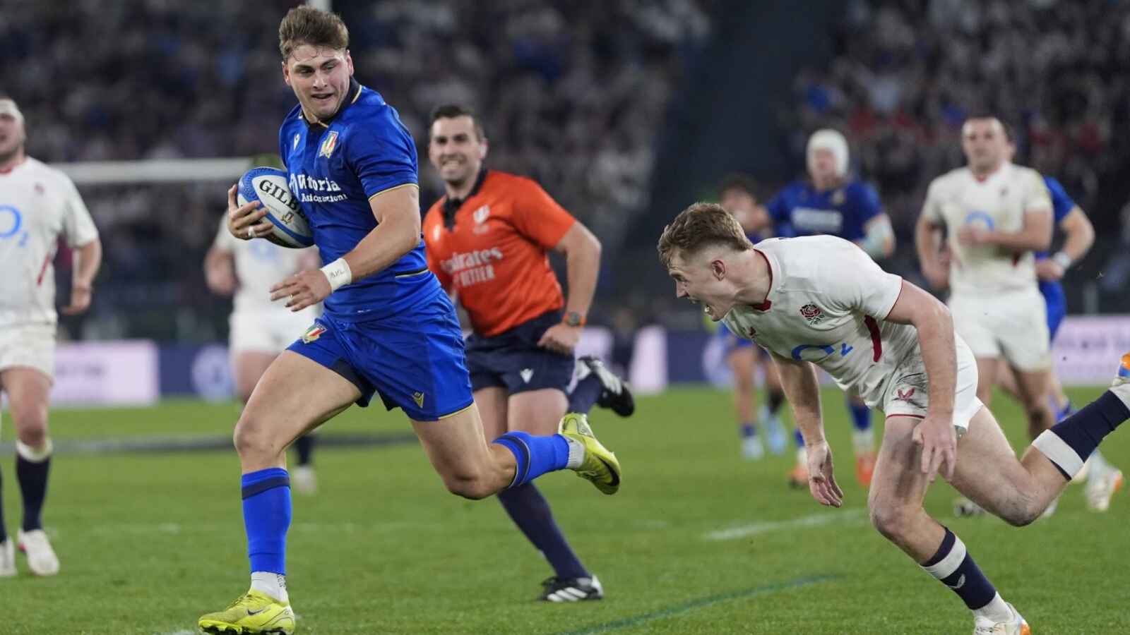 Leonardo Marin on his way to scoring for Italy against England