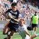 Louis Rees-Zammit speeds past George Hendy to score for Bristol Bears