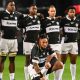Ma’a Nonu performs his solo haka as his Sharks team-mates watch on from behind.