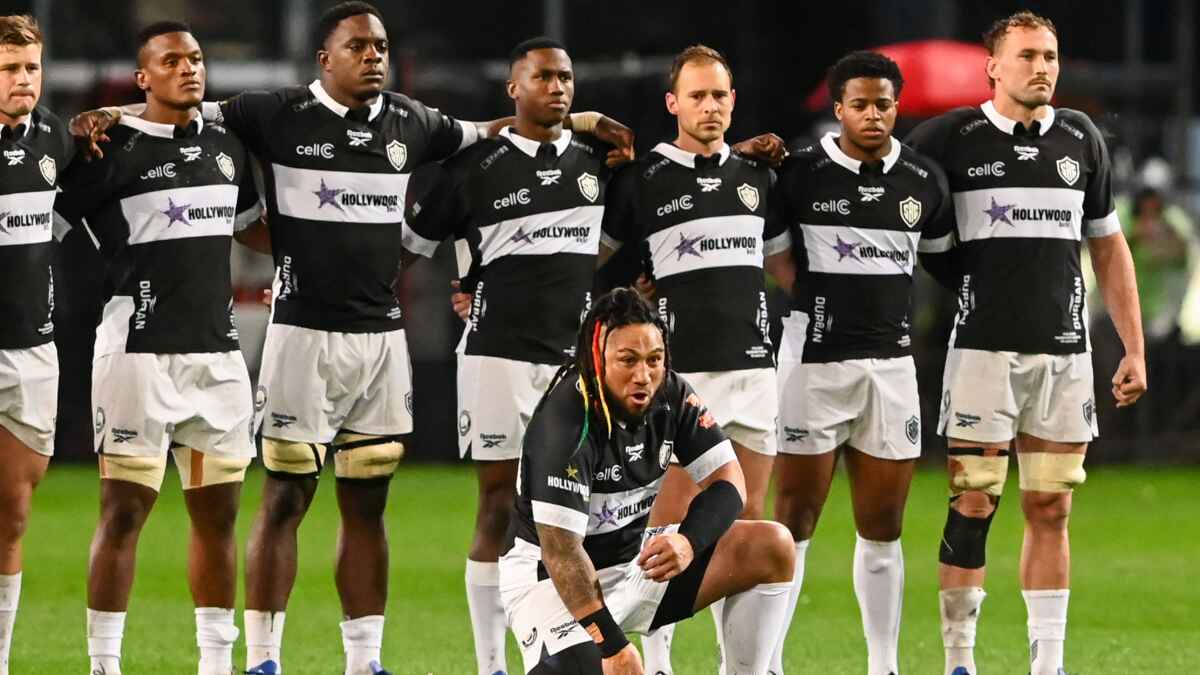 Ma’a Nonu performs his solo haka as his Sharks team-mates watch on from behind.