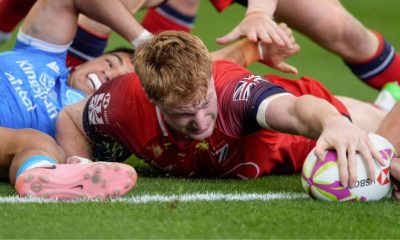 Marcus Kershaw stretches to score for Great Britain.