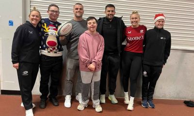Ben Earl and Alex Lozowski (centre) help lead festive celebrations for young people with learning difficulties at the Saracens Foundation Christmas party