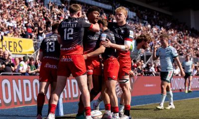 Noah Caluori celebrates his try for Saracens