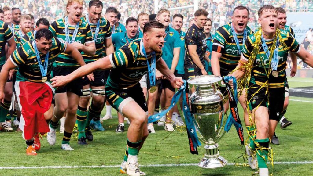Northampton Saints celebrate with the Prem trophy at Twickenham