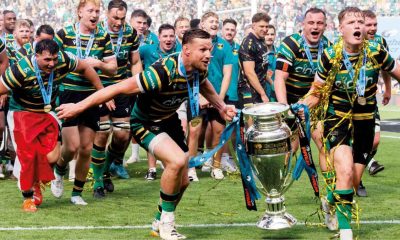 Northampton Saints celebrate with the Prem trophy at Twickenham