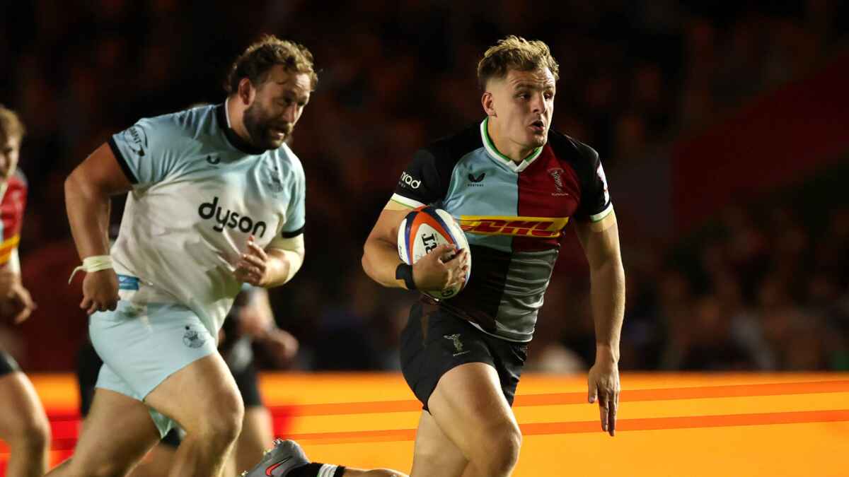 Oscar Beard on the attack for Harlequins