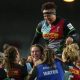 Shaunagh Brown is carried off by her team-mates after her final match for Harlequins