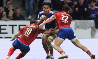 Théo Attissogbe, centre, is challenged by Paolo and Alessandro Garbisi during France’s victory in Lille.