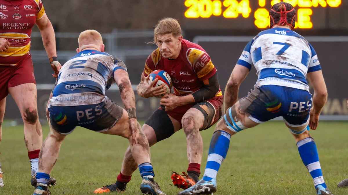 Tom Ailes in action for Sedgley Park Tigers