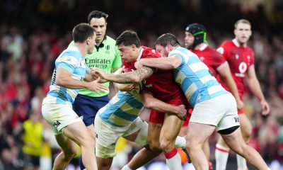 Louis Rees-Zammit, centre, is tackled during Wales' defeat to Argentina in Cardiff