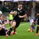 Will Jordan runs through to score for the All Blacks against France