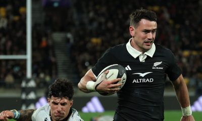 Will Jordan on his way to scoring for New Zealand.