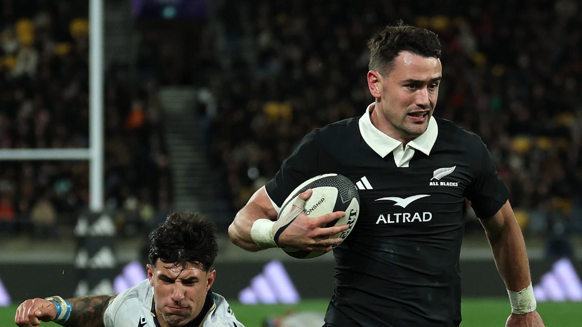 Will Jordan on his way to scoring for New Zealand.
