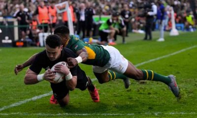 Will Jordan crashes over to score for New Zealand in their victory over South Africa in the first Test in Johannesburg.