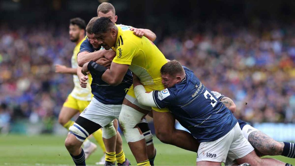 Will Skelton of La Rochelle is tackled by Leinster's Tadhg Furlong during the 2023 Champions Cup final