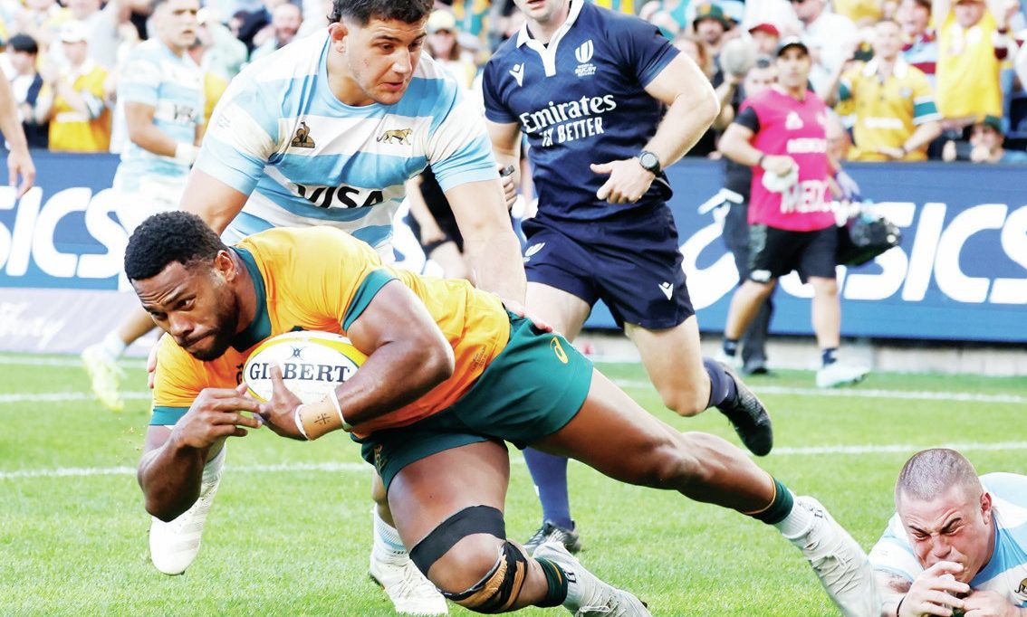 Filipo Daugunu scoring his second try for Australia against Argentina
