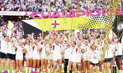 Zoe Aldcroft lifts the trophy