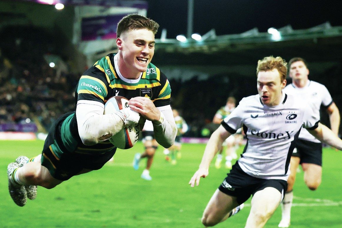 Northampton Saints’ Tommy Freeman dives over for his fourth try