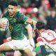 Sacha Feinberg-Mngomezulu runs in the second try for South Africa