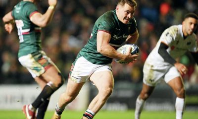Harry Simmons runs in a try for Leicester Tigers