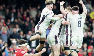 England celebrate scoring during their record win in Cardiff last season