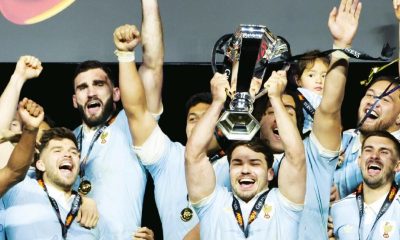 France captain Antoine Dupont lifting the trophy
