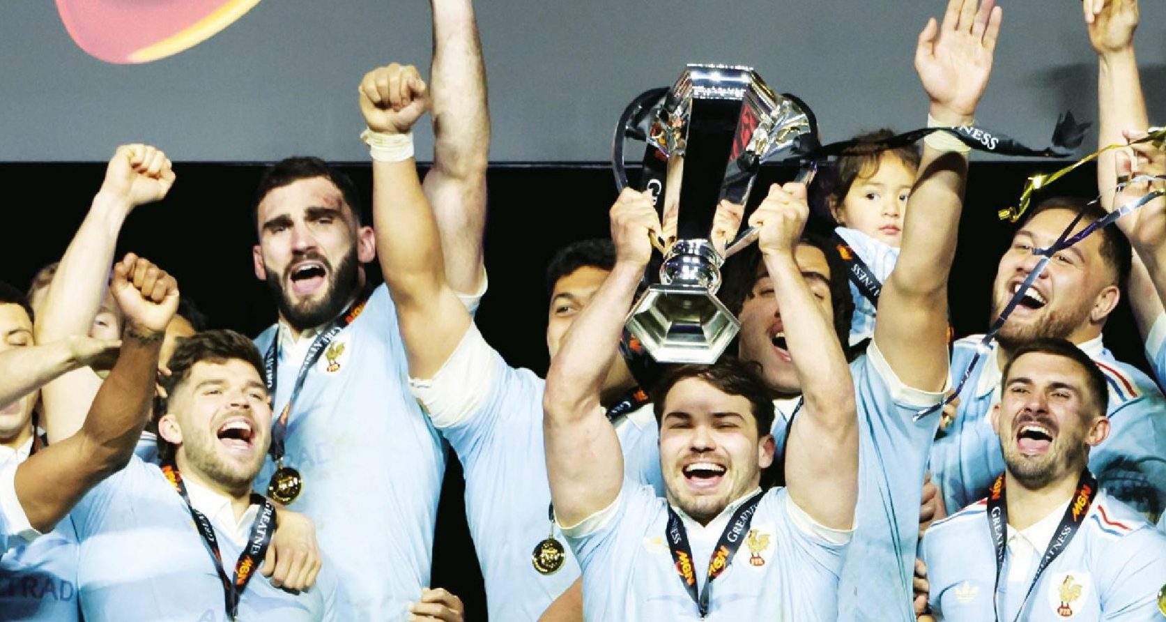 France captain Antoine Dupont lifting the trophy