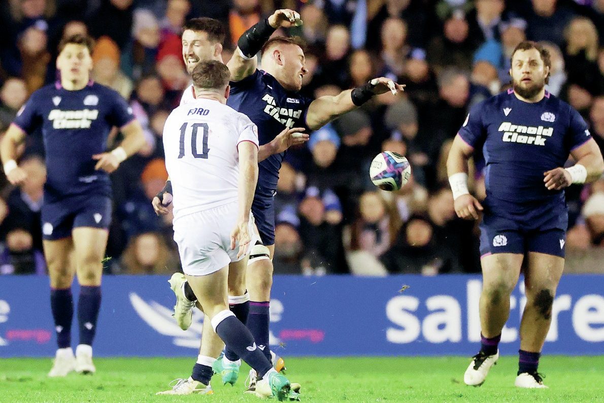 George Ford’s drop goal attempt while an England penalty advantage was being played is charged down leading to a Scotland try