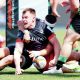 Nick Tompkins celebrates after scoring the third try for Saracens