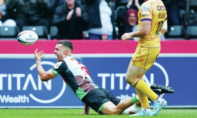 Cameron Anderson celebrates as he scores for Harlequins